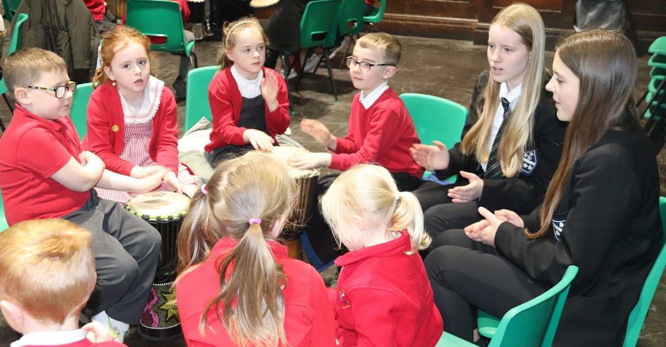 School pupils get together to celebrate love of music with an African drumming workshop