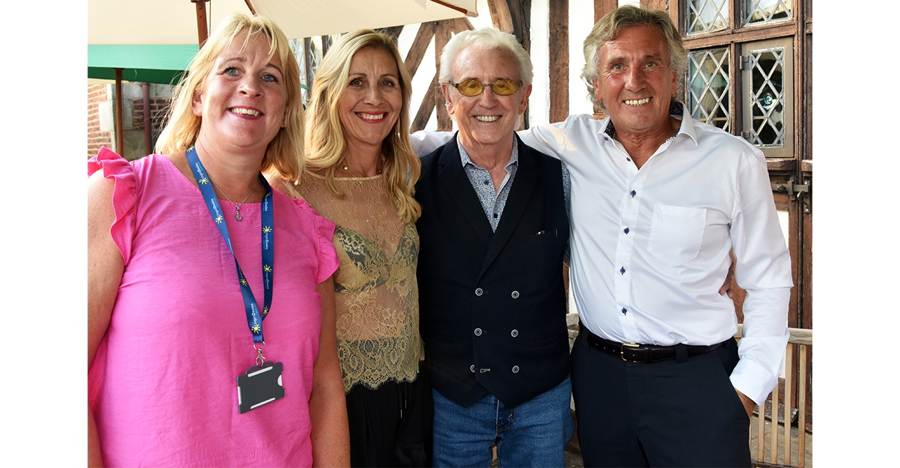 Shropshire fashion show raises £2,000 for Lingen Davies with a surprise visit from Tony Christie