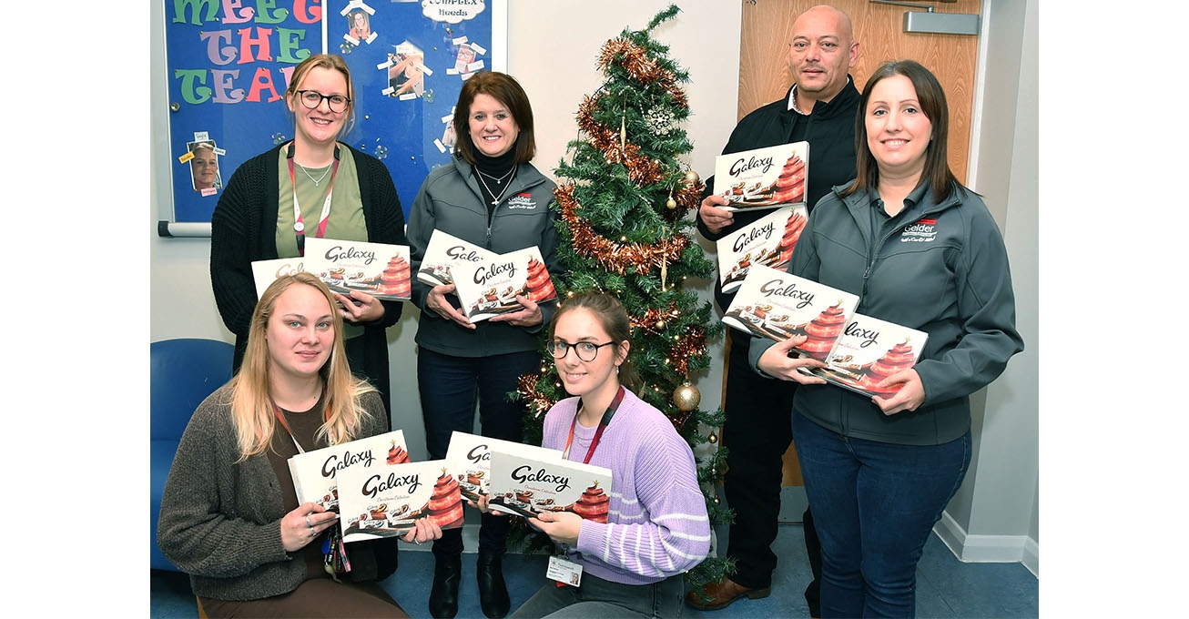 Construction Group presents selection boxes to Charity